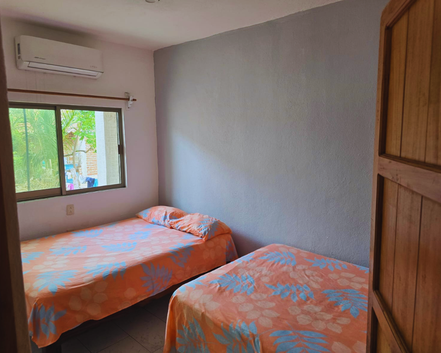 Habitación familiar climatizada con camas matrimoniales