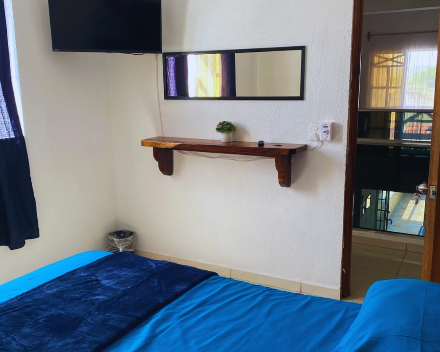 Recámara confortable para huéspedes en Casa Villa Coral